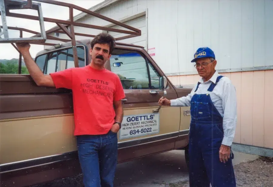 Goettl’s High Desert Mechanical team members standing beside service truck – Prescott Valley AZ