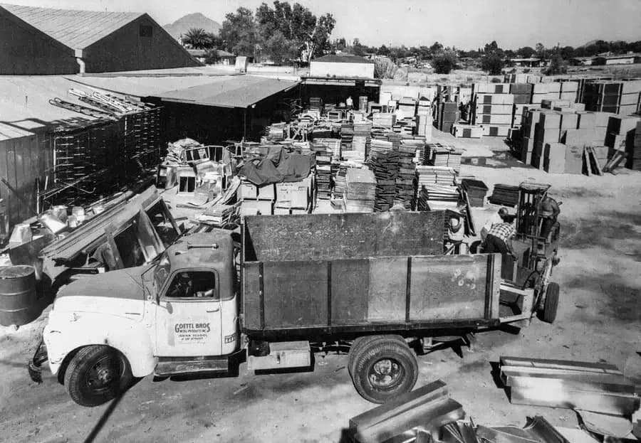 Goettl’s High Desert Mechanical early-yard scene with equipment and service trucks – Prescott Valley AZ