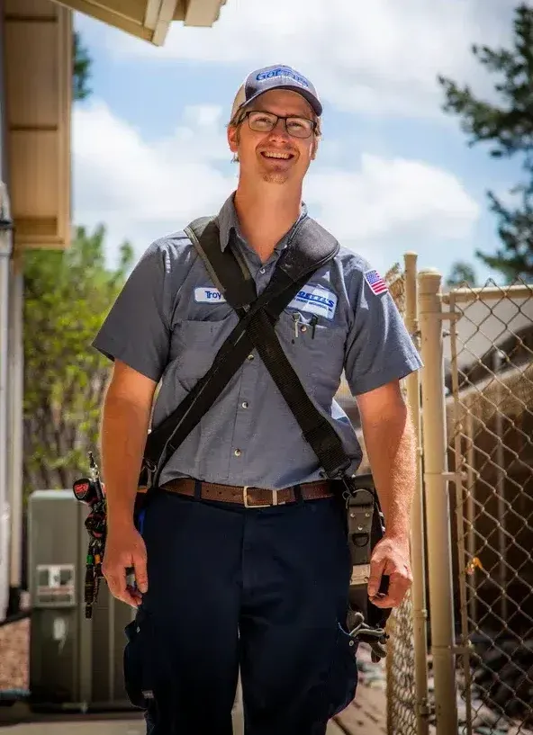 Goettl’s High Desert Mechanical technician at customer property preparing for HVAC inspection – Prescott Valley AZ