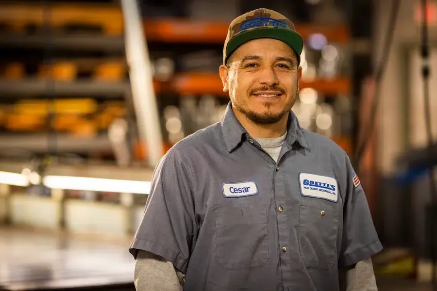 Goettl technician smiling inside warehouse – Prescott Valley AZ
