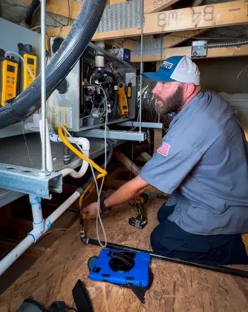 Goettl's tech repairing furnace – Prescott Valley AZ