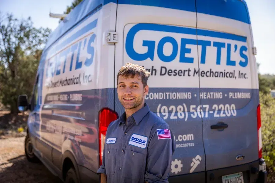 Goettl’s High Desert Mechanical technician smiling in front of truck -Prescott Valley AZ