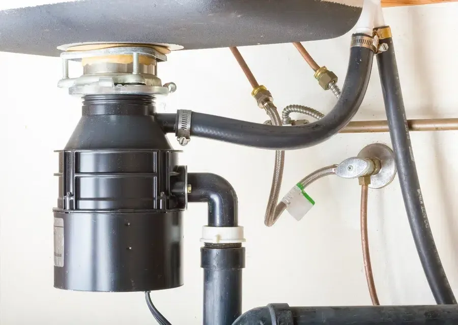 newly installed garbage disposal under kitchen sink in Prescott Valley AZ