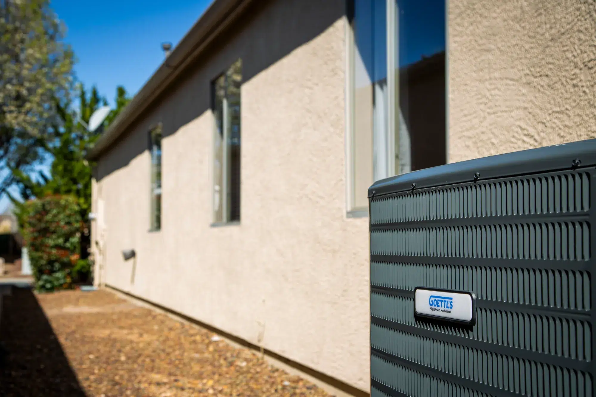 Goettl’s High Desert Mechanical outdoor HVAC condenser installed beside home – Prescott Valley AZ