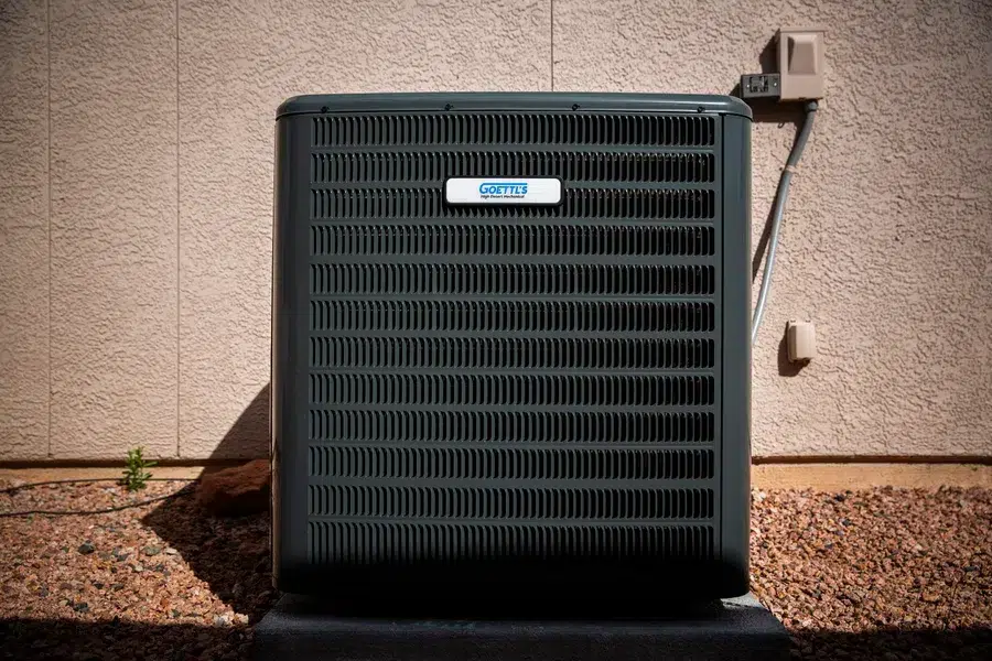 Outdoor Goettl HVAC condenser unit next to home exterior – Prescott Valley AZ