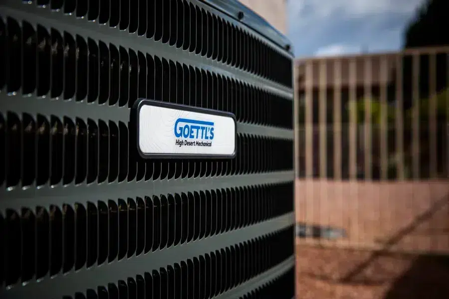Close-up of Goettl outdoor HVAC condenser unit grille – Prescott Valley AZ