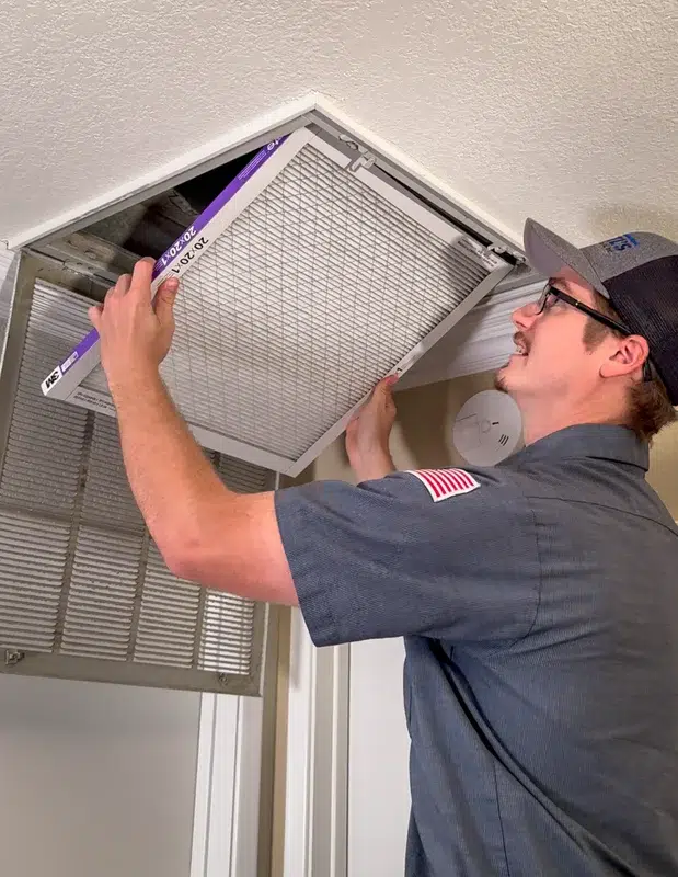 Goettl's tech installing new air filter in ceiling return vent – Goettl’s High Desert Mechanical Prescott Valley AZ