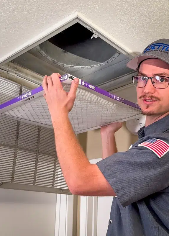 Goettl's tech installing new air filter in ceiling return vent – Goettl’s High Desert Mechanical Prescott Valley AZ