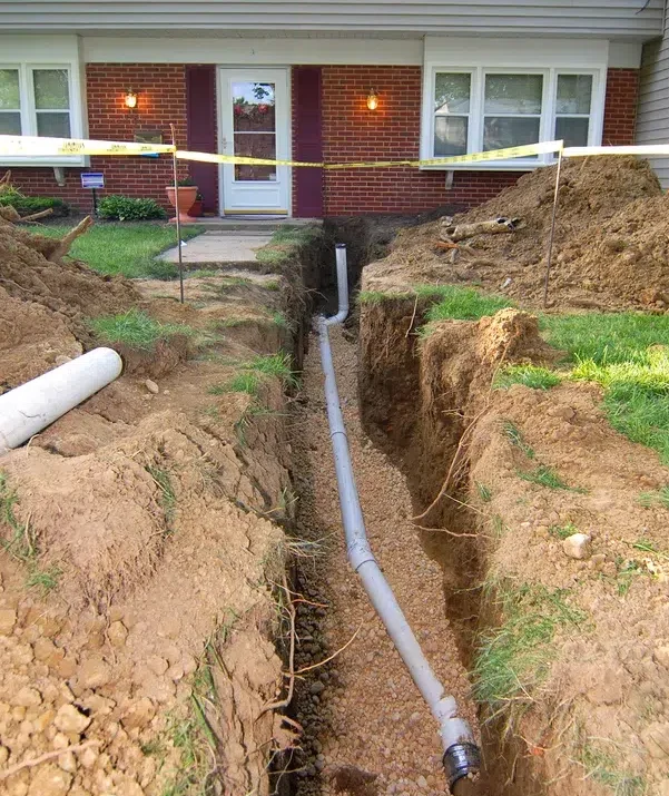 sewer line repair in homeowner's yard