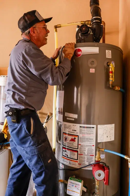Goettl’s High Desert Mechanical plumber checking water heater – Prescott Valley AZ